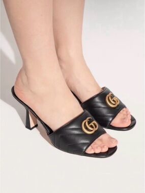 Gucci Black Quilted Leather Slide Mules include box and 2 dust bags worn once!